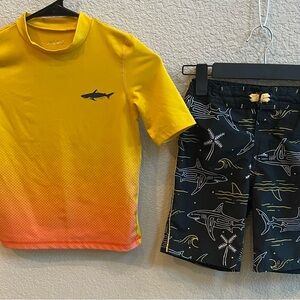 Boys rash guard and swim trunks. Size 7